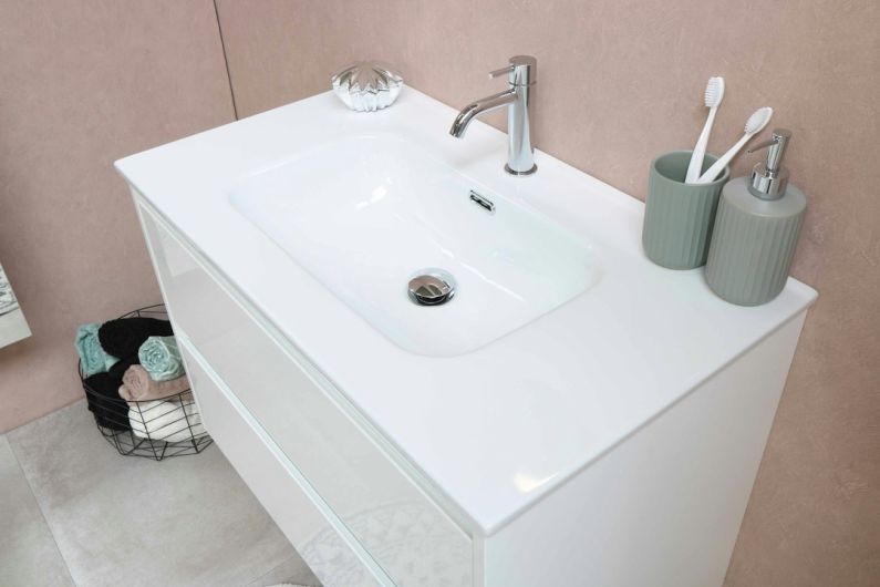 Bathroom Organization - white ceramic sink with stainless steel faucet