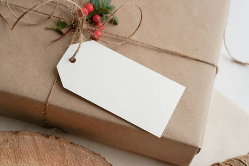 Holiday Decoration Storage - a present wrapped in brown paper and tied with twine