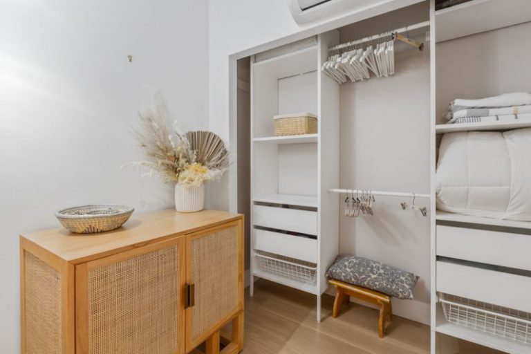 Closet Organization - brown wooden bed frame with white bed mattress