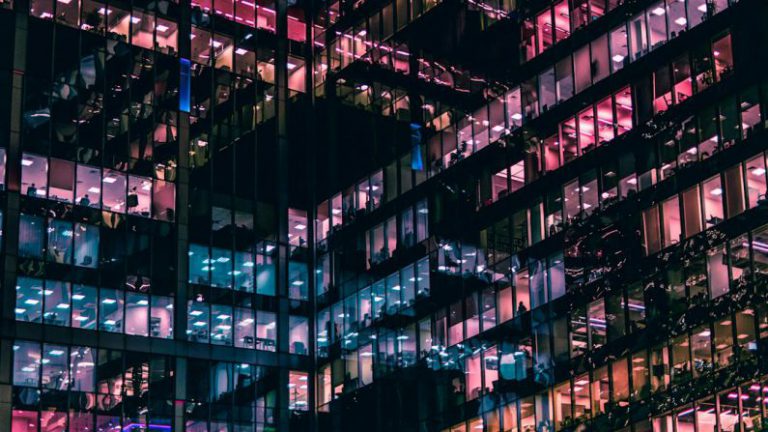 Window Update - architectural photography of building with people in it during nighttime