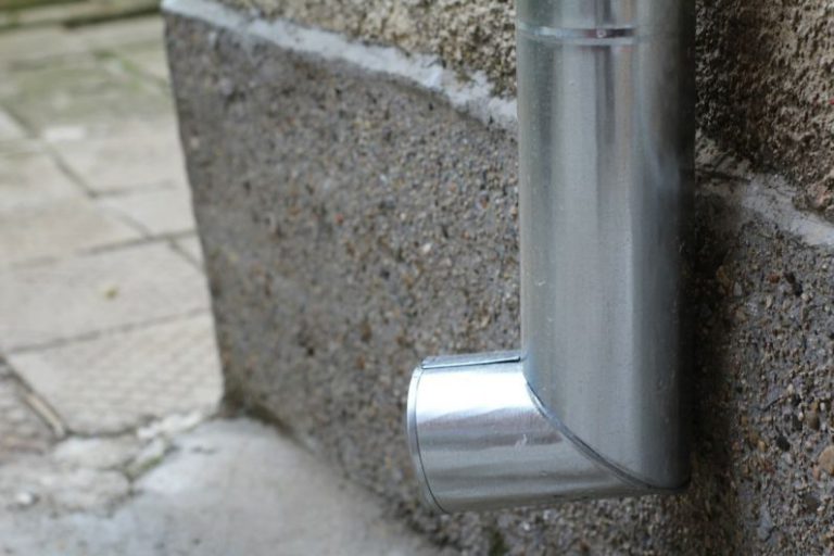 Clean Gutters - a close up of a metal object on a wall