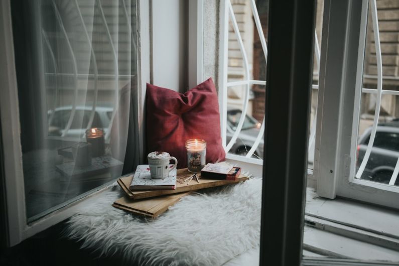 Reading Nook - photo of gel candle on board beside pillow