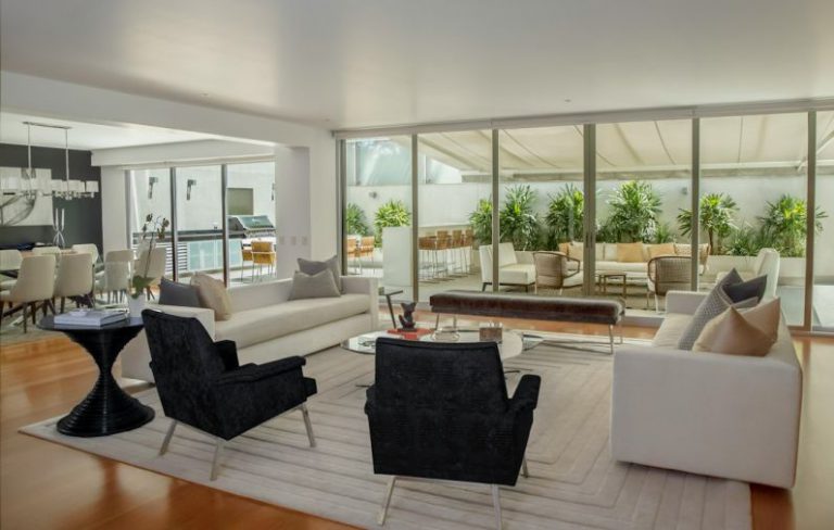 Biophilic Design - two black suede armchairs during daytime